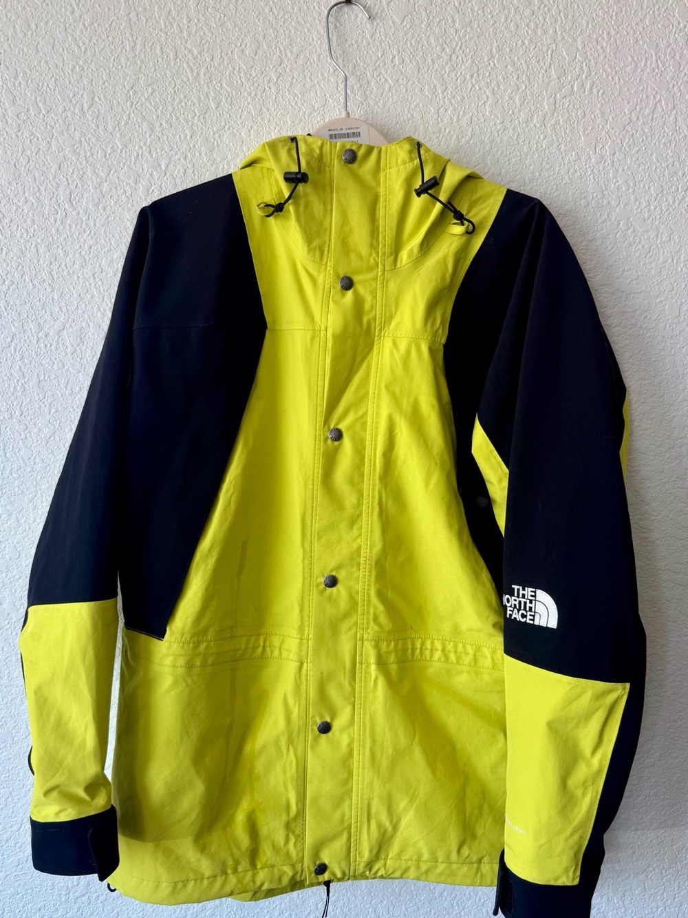 The North Face Men’s Yellow and Black Hooded Jacket